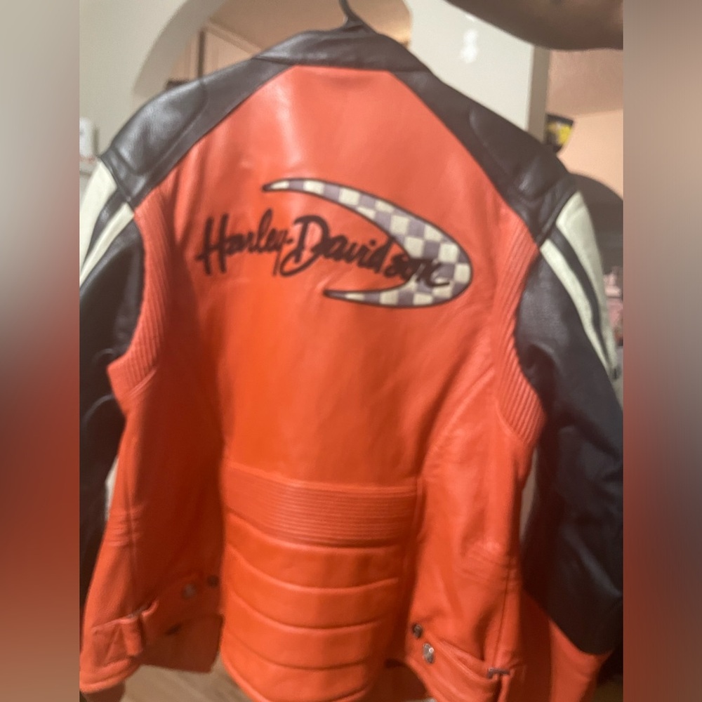 S size, large unisex, Harley Davidson, genuine, leather jacket, orange and black